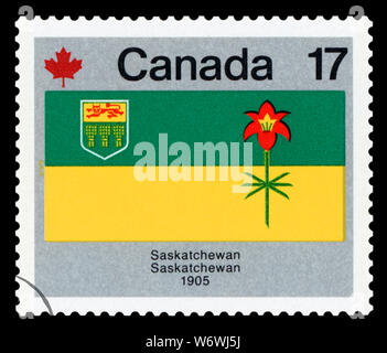 CANADA - CIRCA 1979: A stamp printed in Canada from the `Canada Day. Flags` issue shows Saskatchewan flag, circa 1979. Stock Photo